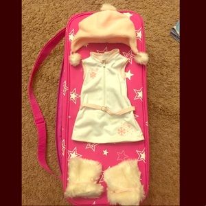 Seven American Girl Doll outfits with doll case